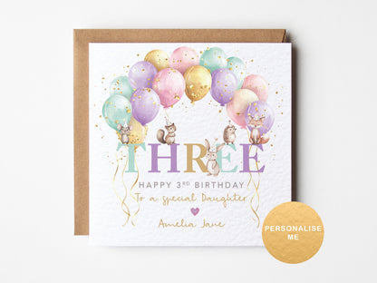 Age 3 card with balloon arch and animals sat on the word three. Personalised with relation and name