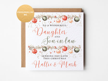 Christmas card for a daughter and son-in-law with decorative elements and personalized text.