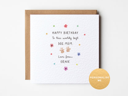 Greeting card for a dog mom with flowers and paw prints on a white background