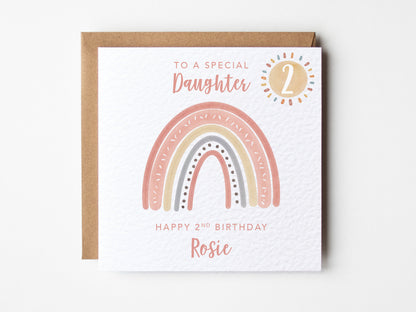 Birthday card  with rainbow design and personalised text on a white background.