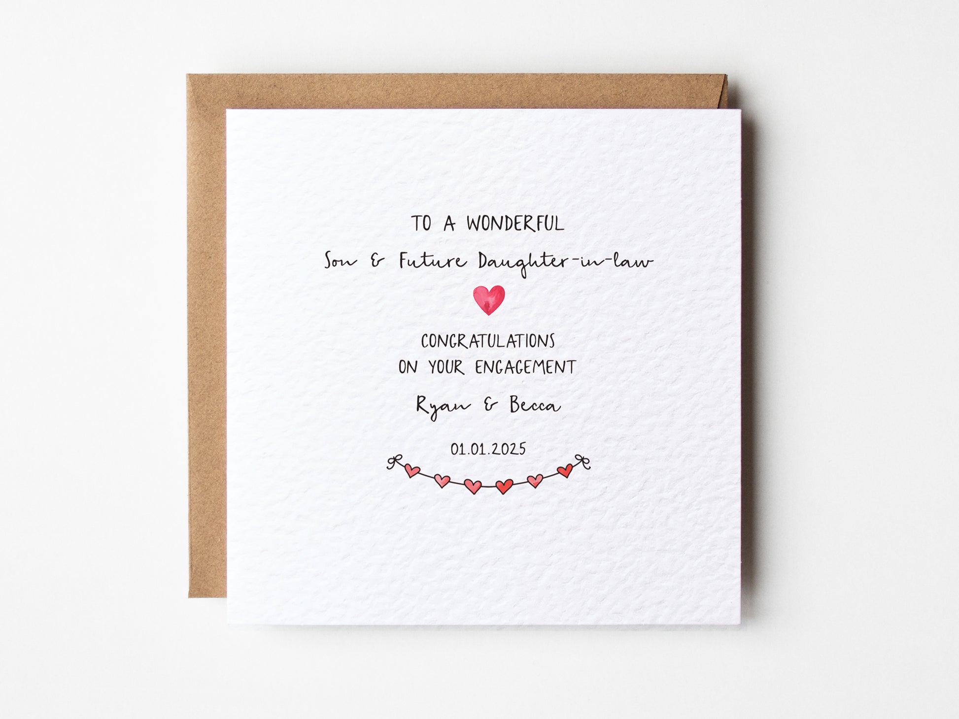 Engagement card for a wonderful son and future daughter-in-law with hearts and text on a white background.