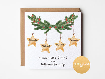 Christmas card with stars and tree branches on a white background