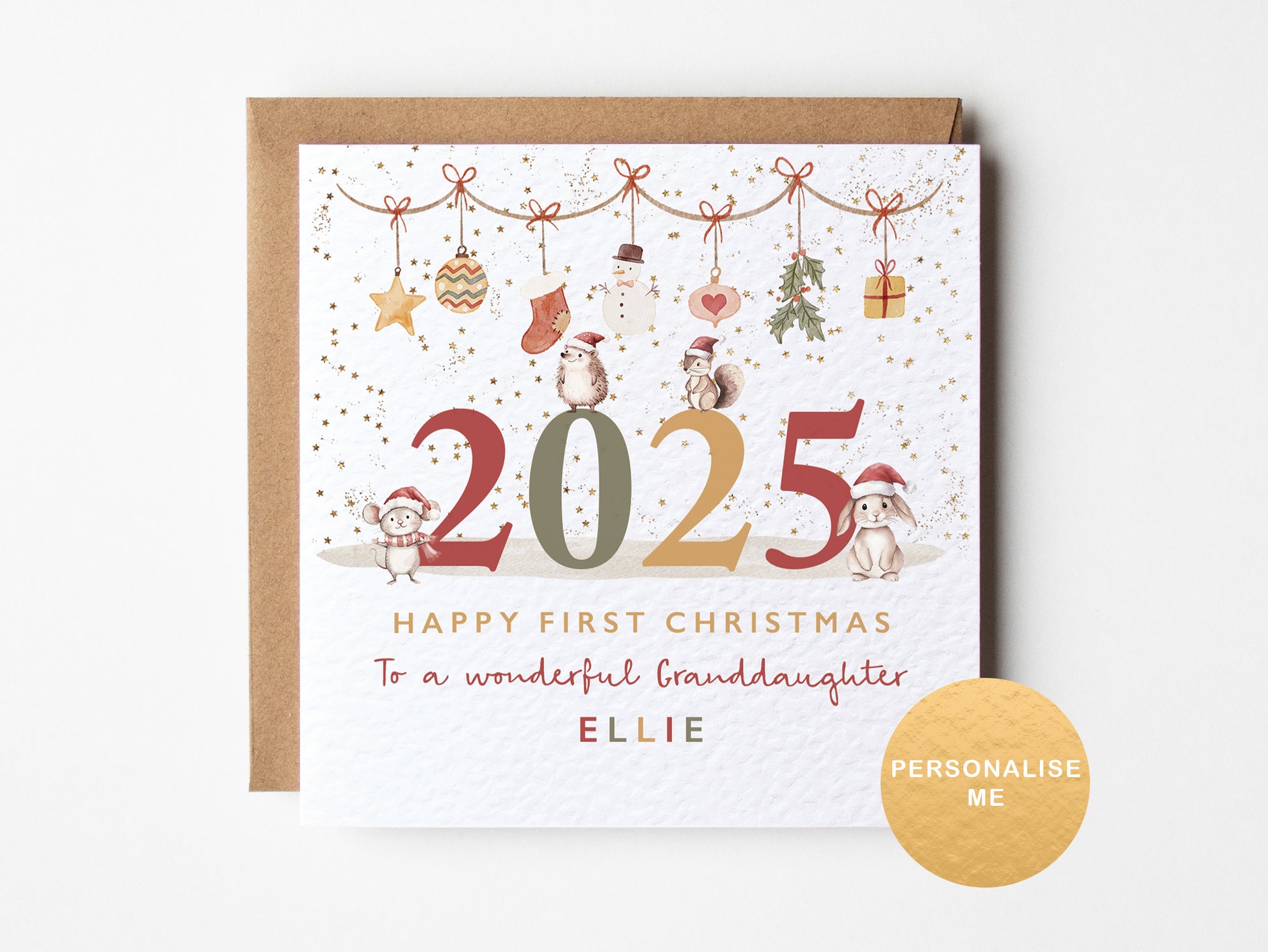 Christmas card with '2025 Happy First Christmas' text and decorative elements on a white background.