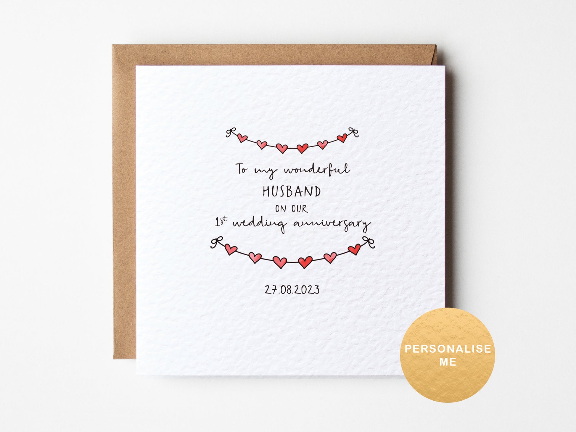 Personalised 1st wedding anniversary card for husband with red heart garland design and custom date, romantic paper anniversary card